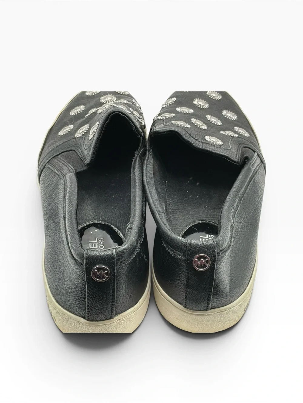 Michael Kors Leo Starburst black leather slip-on Flats & silver sunburst studs